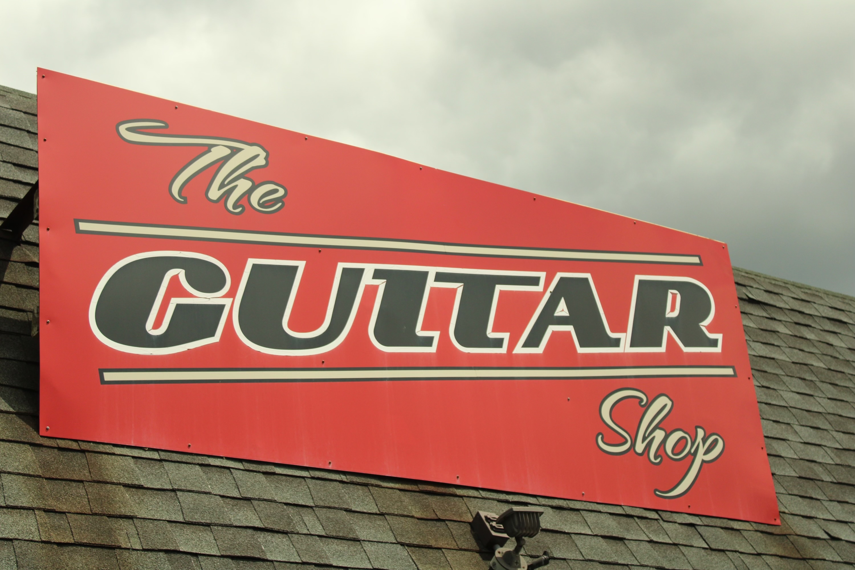 The Guitar Shop's front sign